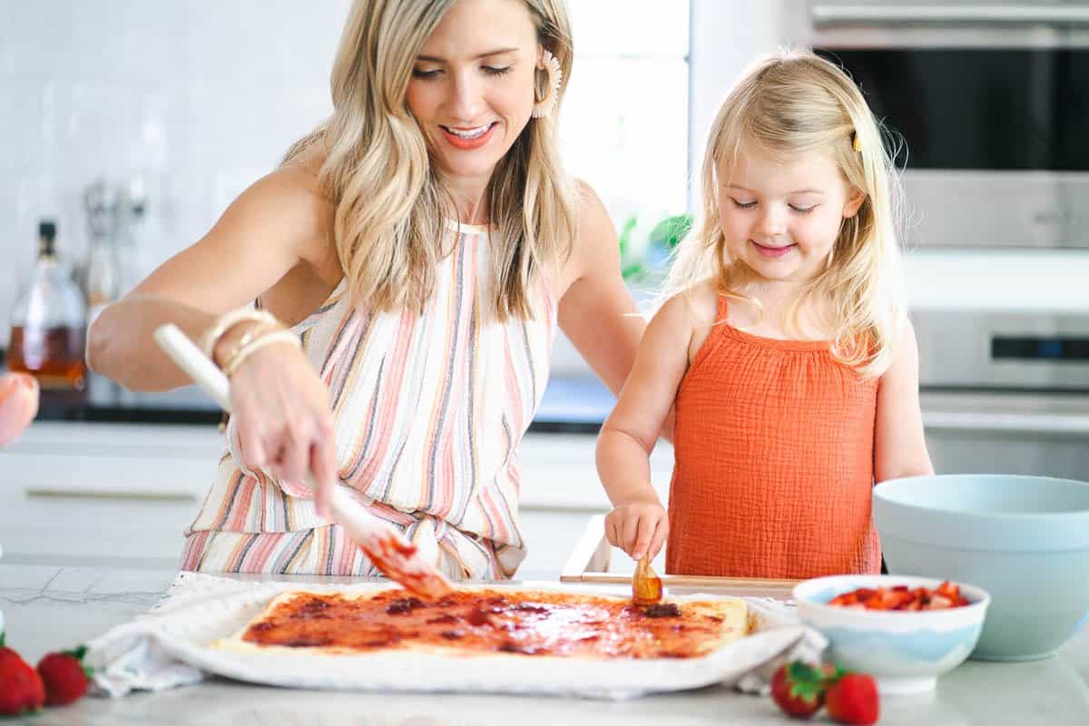 making strawberry sponge cake with my 3-year-old