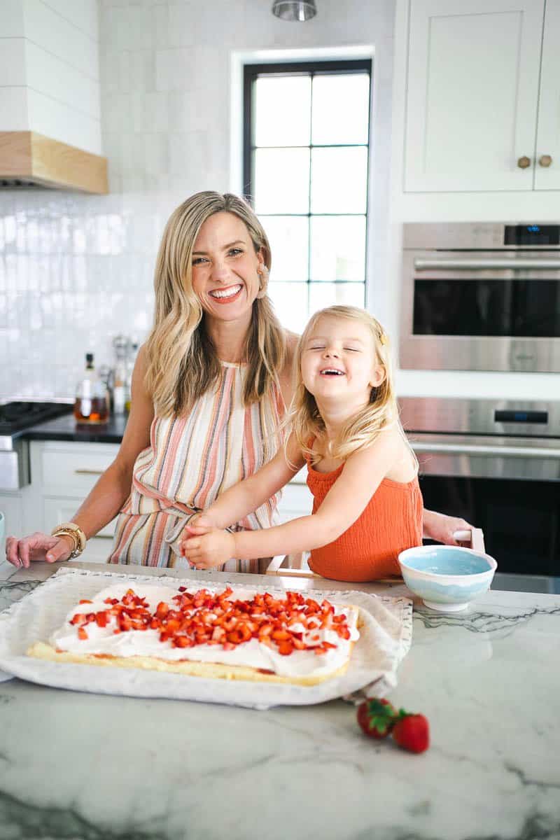 filling the cake with my 3-year-old daughter