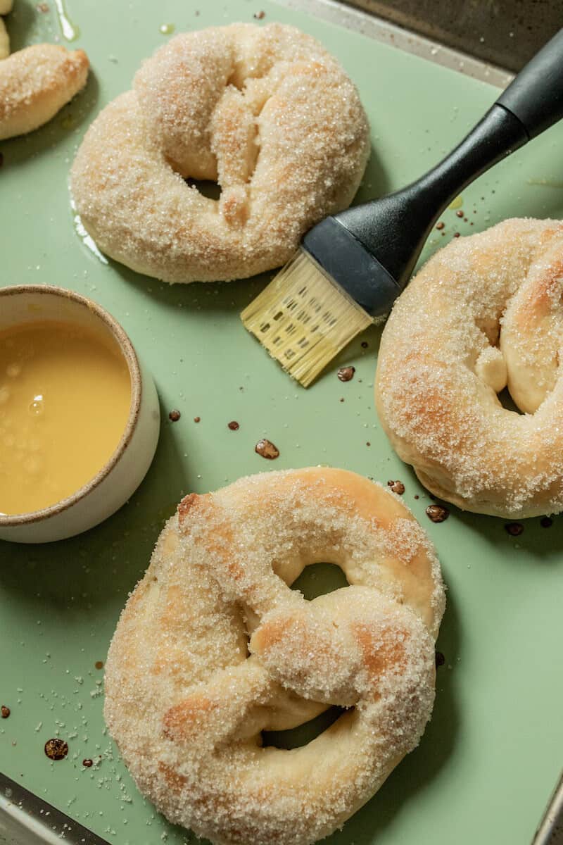 freshly baked Martinsbrezeln on a baking sheet