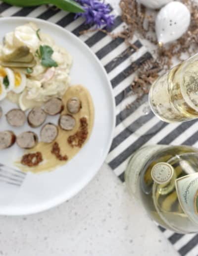 Oma Sieghilde's creamy potato salad paired with a glass of Schlumberger Grüner Veltliner