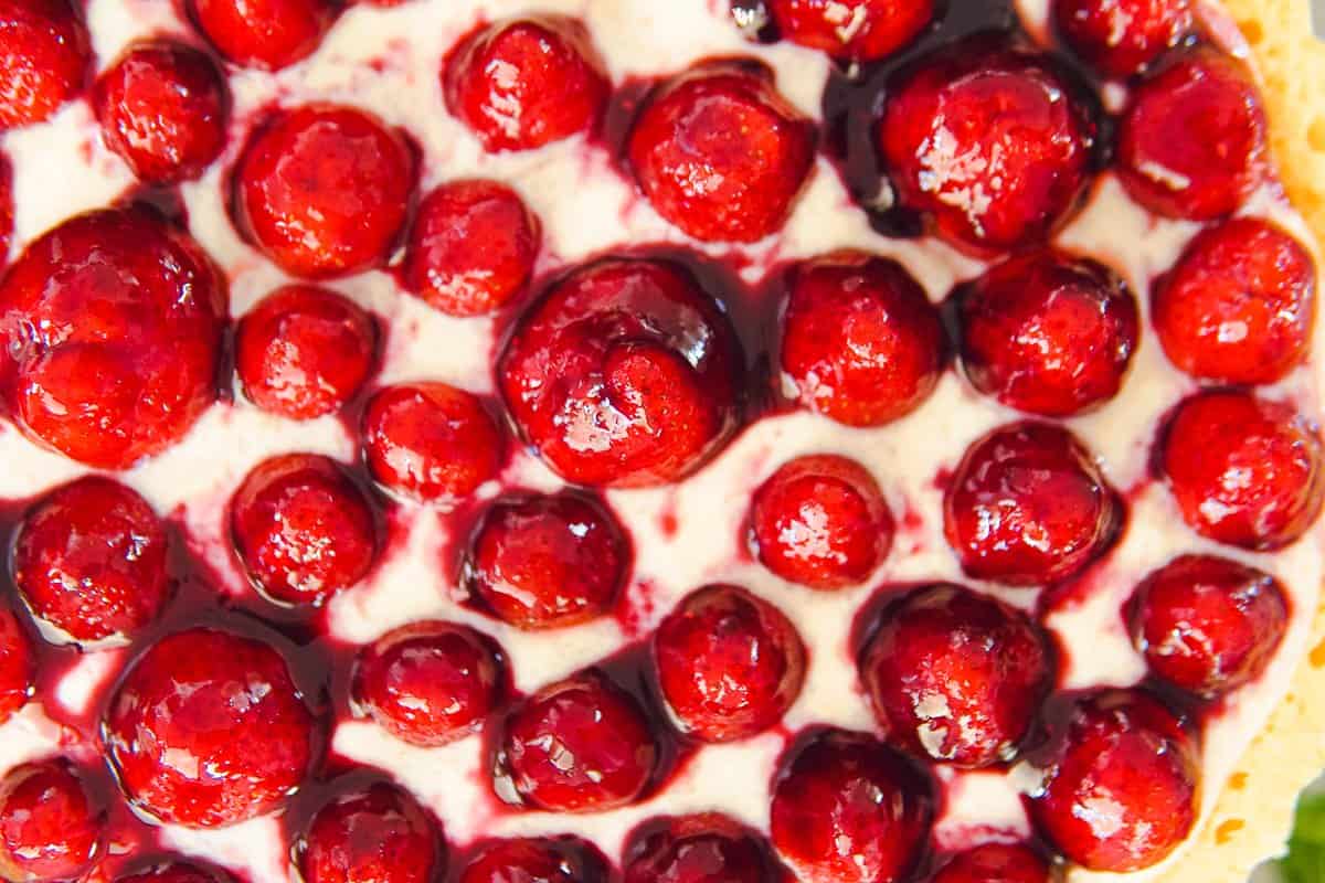 freshly glazed strawberry cake