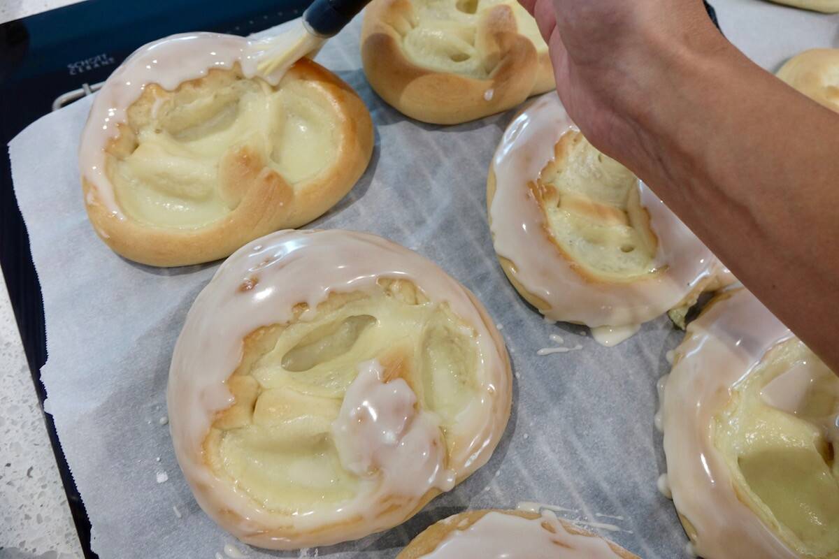 German pudding pretzel being glazed and almost ready to eat!