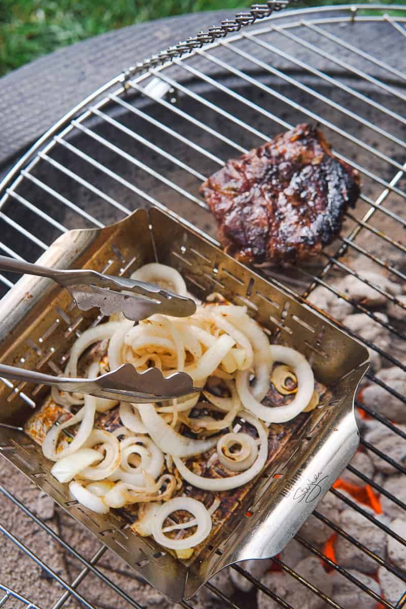 onions in a grilling basket