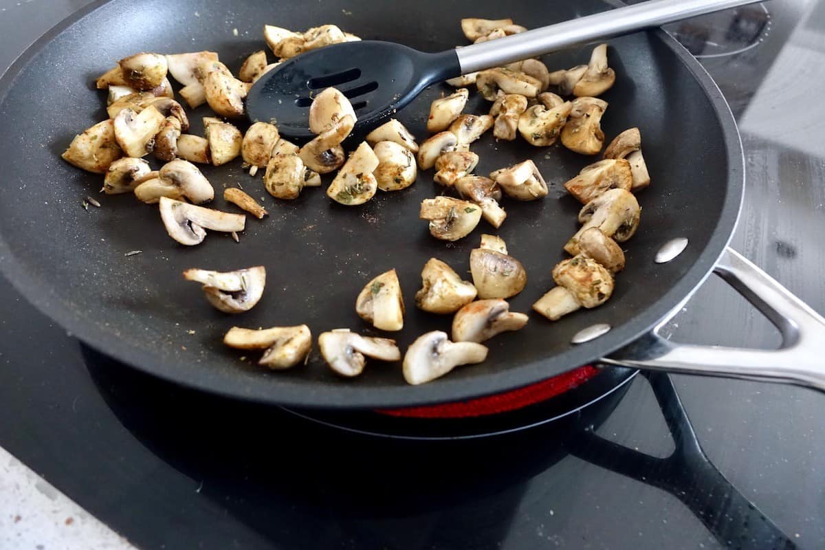 Sautéing mushrooms for the mushroom skillet
