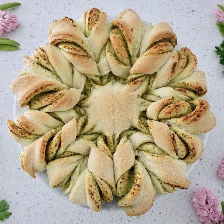 Brotblume pesto bread flower surrounded by flowers