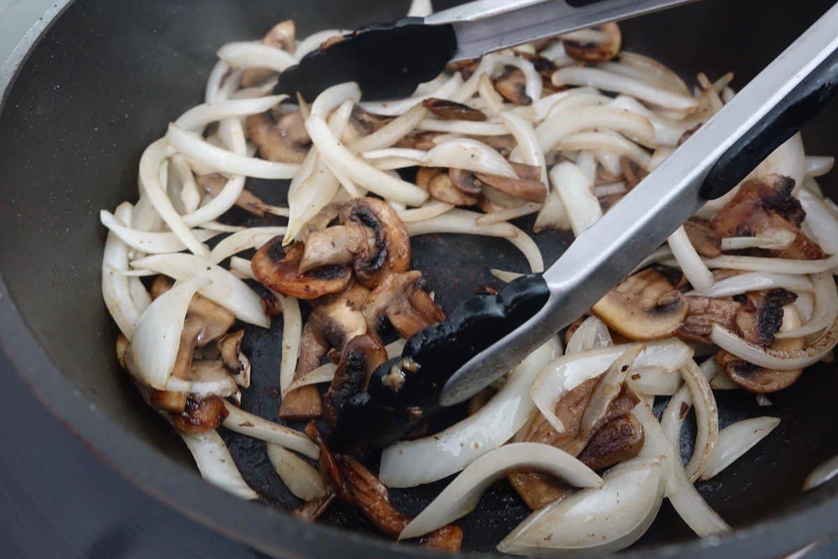Sauteeing mushrooms and onions for the Zigeunerschnitzel