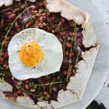 breakfast flatbread topped with a fried egg