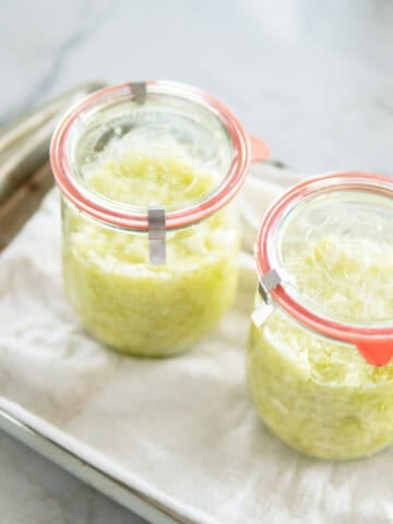 Homemade sauerkraut in canning jars.