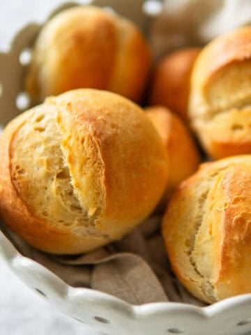 crusty German bread rolls in a basket