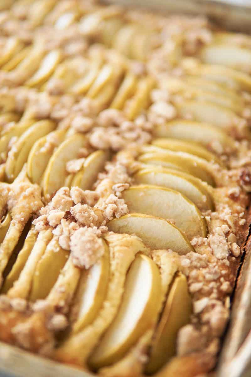 closeup of baked cake on sheet pan