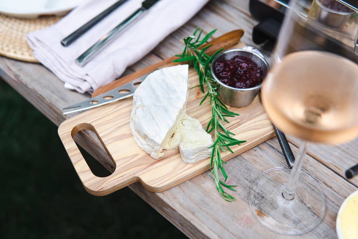 camembert and lingonberry jam for melting in raclette pans