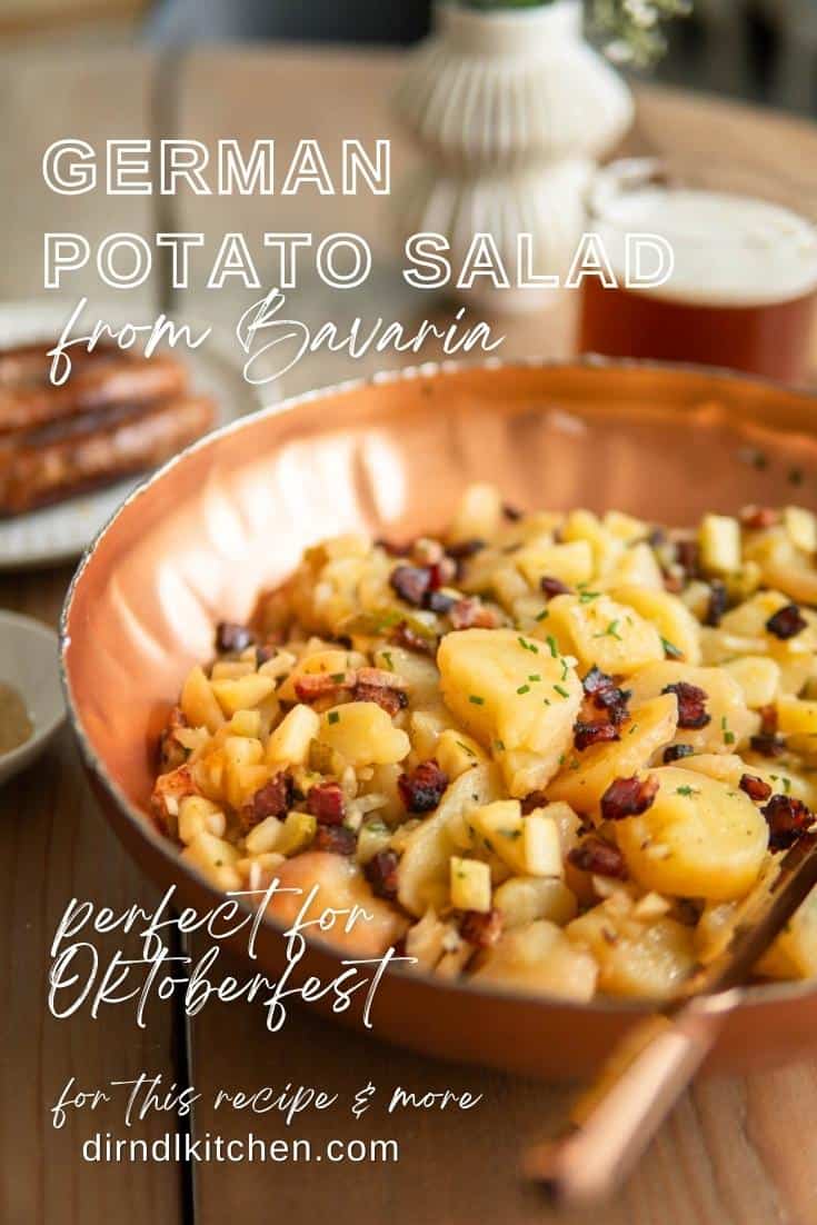 bowl of warm German potato salad in copper bowl