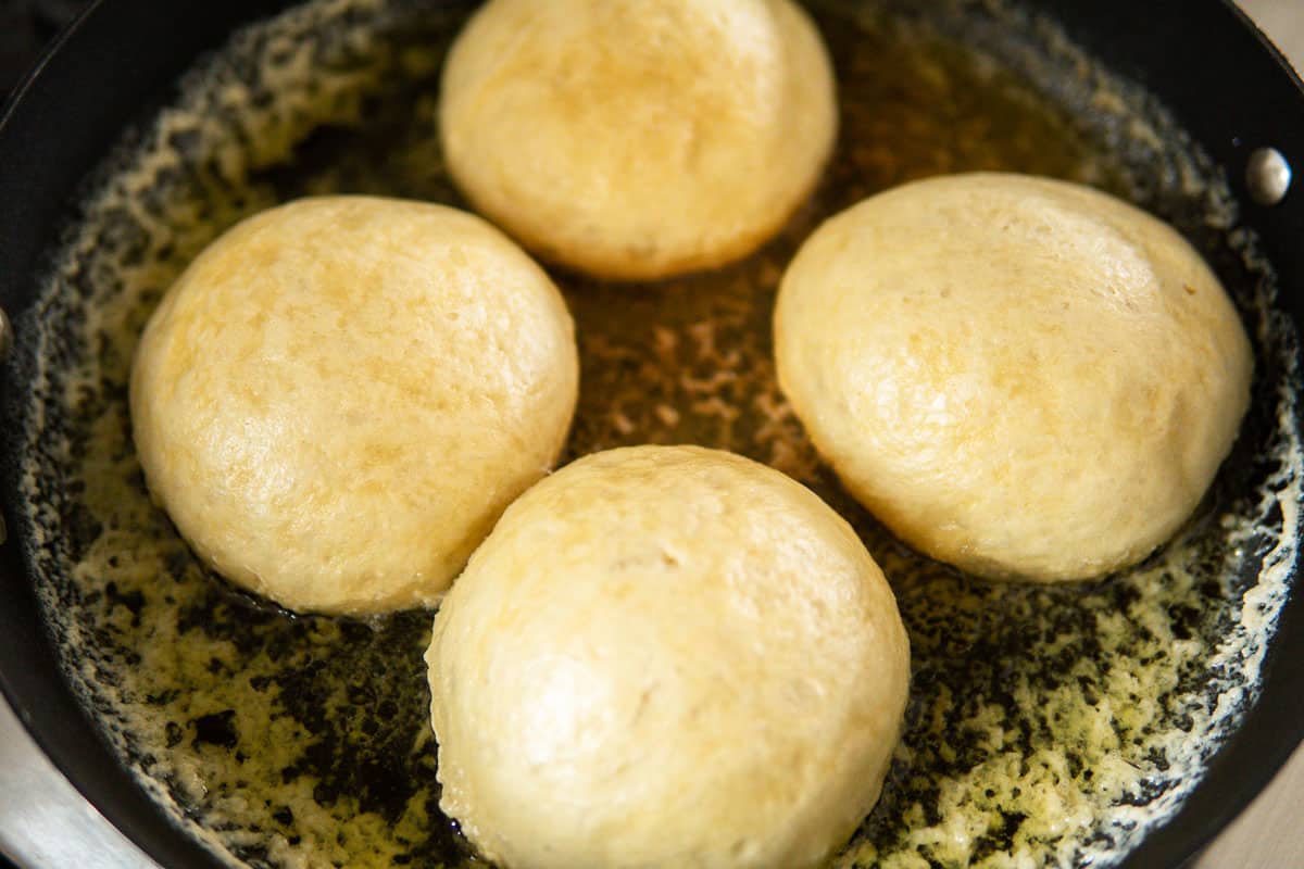 steamed German yeast dumplings sitting in pan