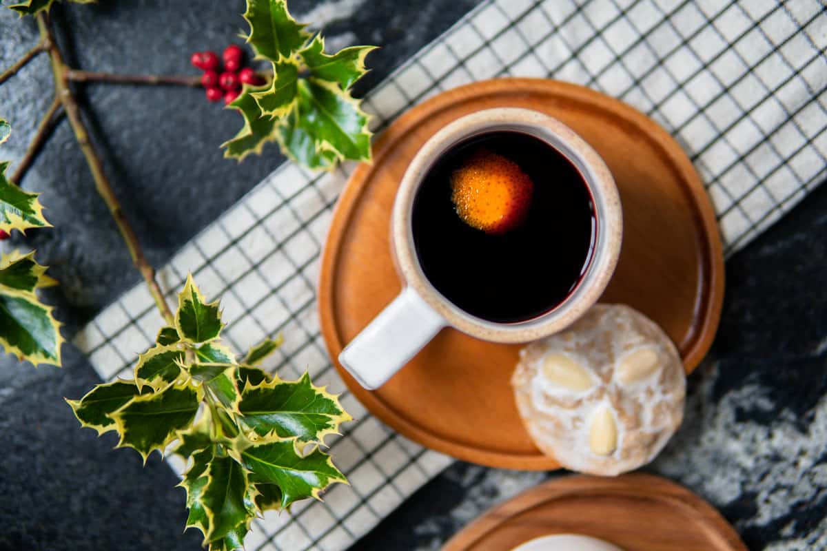 cup of mulled wine with a gingerbread cookie