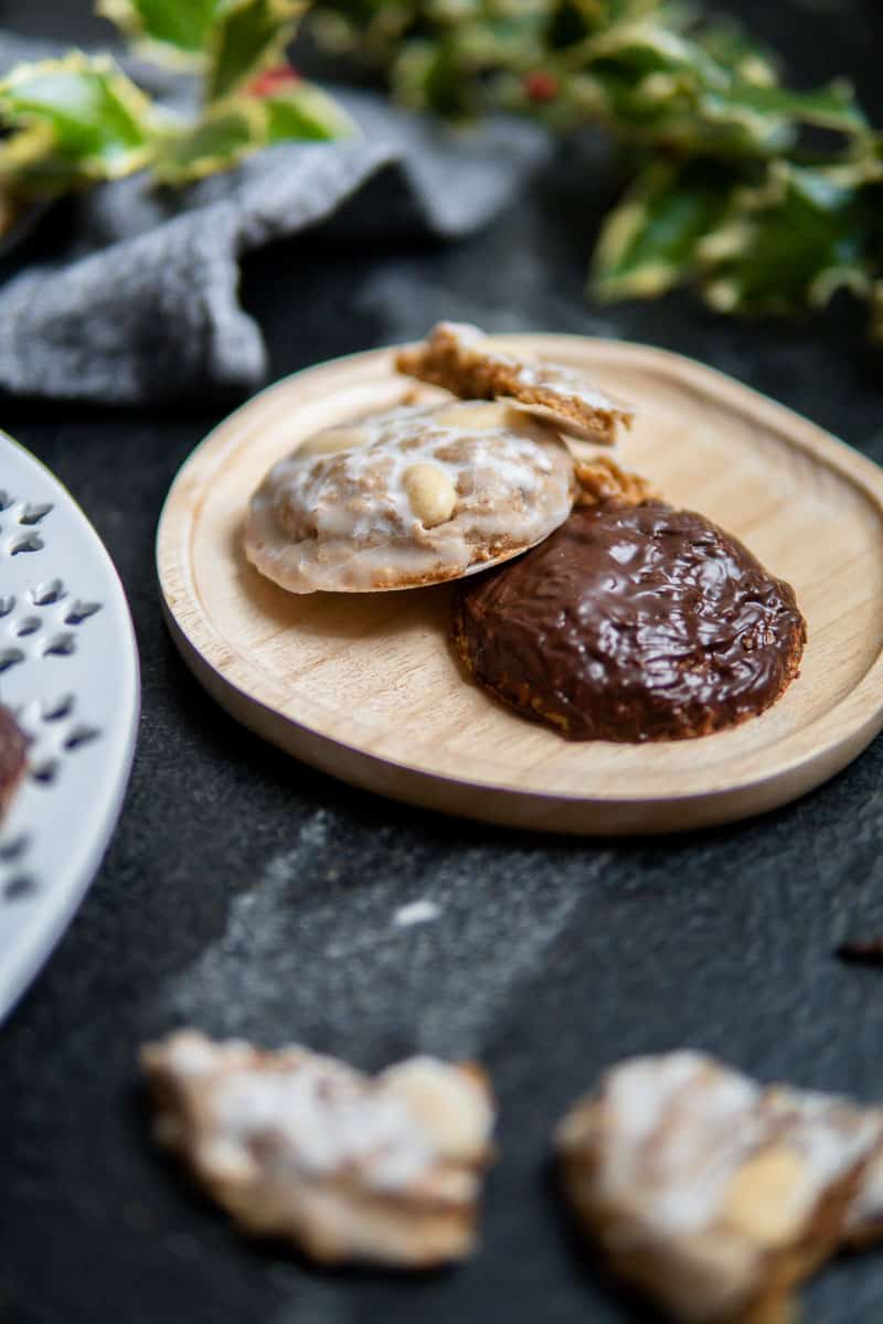 glazed gingerbread cookies on a wooden plate