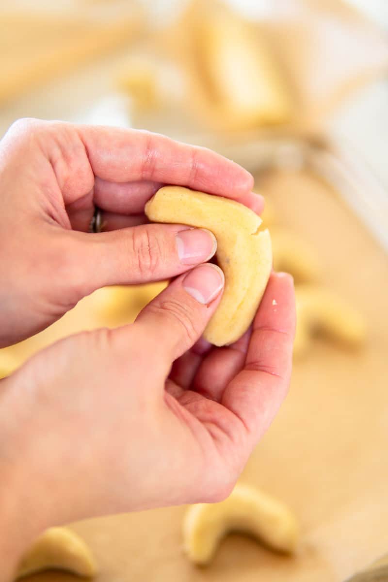 shaping Vanillekipferl cookies