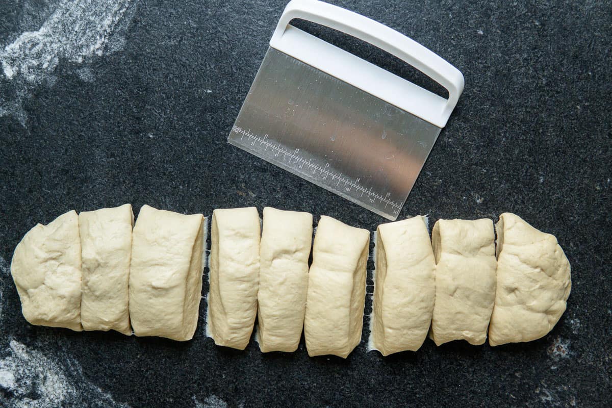dividing bagel dough into portions
