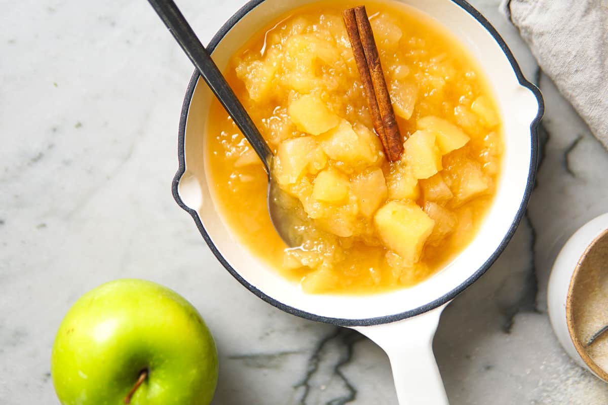 chunky apple sauce in a white pan