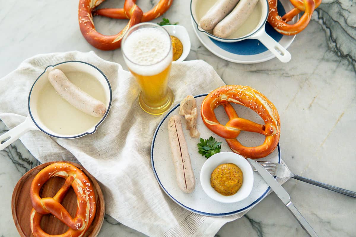 Bavarian breakfast with weisswurst, pretzels, sweet mustard and Bavarian wheat beer