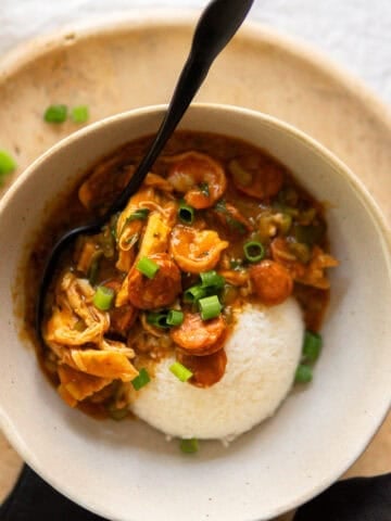 Authentic Gumbo in a bowl with rice, inspired by the German Coast in Louisiana.