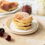 Closeup of a stack of fluffy German pancakes made with yeast.